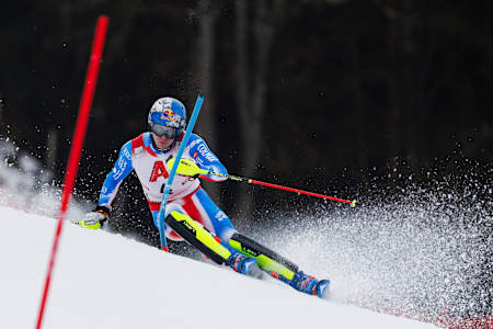In the 2024 2025 season, Clément Noël carves through the snow at the Hahnenkamm Race in Kitzbühel, Austria