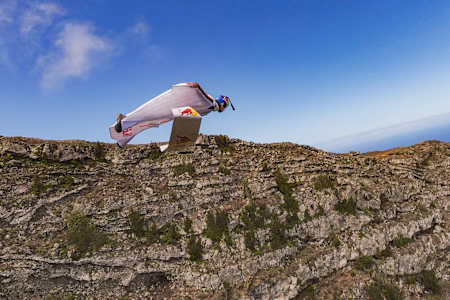 Peter Salzmann seen during the Red Bull Wingsuit Foil Project at El Hierro, Spain on September 3, 2025. Drone piloted by Ivan Merino, image processed by Sebastian Marko. 