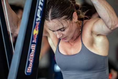 A woman on the ski erg: When pressure rises, your mind can work with you or against you.