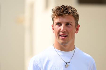 Liam Lawson of New Zealand and Visa Cash App Racing Bulls arrives in the Paddock prior to final practice ahead of the F1 Grand Prix of Abu Dhabi at Yas Marina Circuit on December 06, 2025 