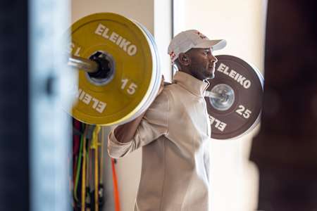Mutaz Barshim powers through a workout in the gym 