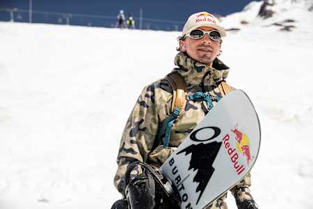 Mark McMorris poses with is snowboard at the top of the lane at Timberline Lodge on July 12, 2022