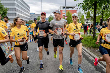 Marco Odermatt (C-L) and Simon Ehammer (C-R) of Switzerland perform during the Wings for Life World Run Flagship Run in Zug, Switzerland on May 05, 2024.