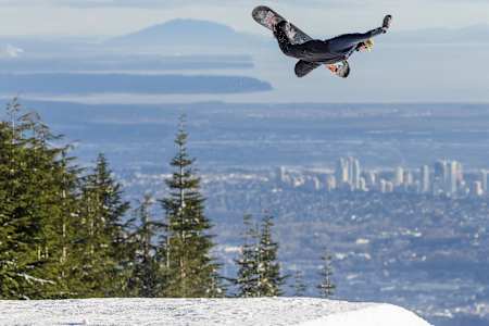 Snowboarder Mark McMorris hits a kicker during the Red Bull Uncorked event on Grouse Mountain in Vancouver, Canada, 2017.