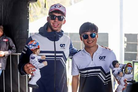 Pierre Gasly and Yuki Tsunoda at the Fans Forum during practice ahead of the F1 Grand Prix of Mexico at Autodromo Hermanos Rodriguez on October 28, 2022 in Mexico City, Mexico. 