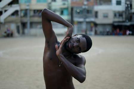 Andrezinho DB poses for a portrait at Tijuquinha's field in Rio de Janeiro, Brazil on March 17, 2024  .