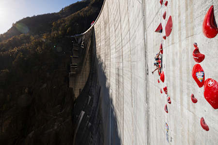Jessica Pilz of Austria climbs the 180m multi-pitch man made route at the Verzasca Dam during the final of Red Bull Dual Ascent in Verzasca, Switzerland on November 2, 2024.