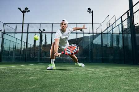 Ale Galán, on February 10, 2022, demonstrates his athletic prowess on the padel court in Madrid, Spain, during an intense performance.
