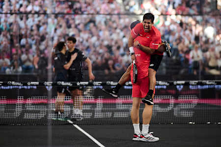 Alejandro Galan and Federico Chingotto engaged in joyous celebration during the 2025 Lotto Brussels Premier Padel P2 by Belfius, showcasing intense emotion and triumph.