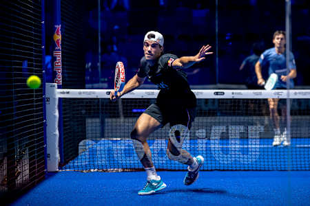 Juan Lebrón displays his skills during the third-place match at the Premier Padel 2024 Finals, held in vibrant Barcelona, Spain, on December 22, showcasing intensity and precision.
