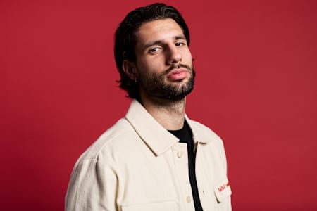 Dominik Szoboszlai poses for a photo, he was a key player in Liverpool's Premier League-winning team.