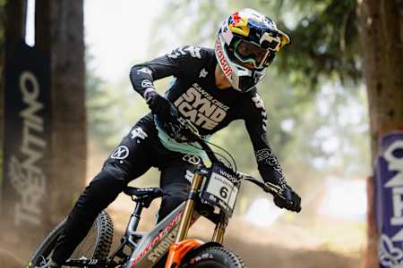 Jackson Goldstone races down the Val di Sole track during the 2025 UCI Mountain Bike World Cup in Italy.
