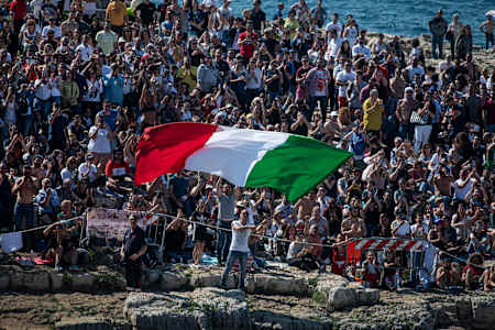 Spectators turn out to support the Red Bull Cliff Diving World Series each time it touches down in the European spiritual home of cliff diving