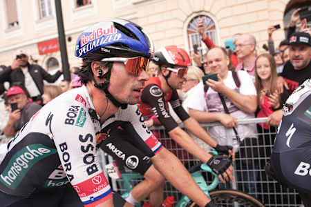 Primož Roglič powers ahead for Red Bull - BORA - hansgrohe during stage 14 of the Giro d’Italia 2025, from Treviso to Nova Gorica, as enthusiastic fans line the Italian streets.