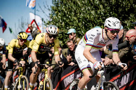 World champion Tadej Pogačar setting the pace ahead of Wout Van Aert during the 109th Ronde van Vlaanderen 2025 from Bruges to Oudenaarde in Belgium