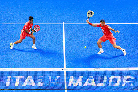 Federico Chingotto (L) of Argentina and Alejandro Galan of Spain compete during the BNL Italy Major Premier Padel final match held at the Foro Italico in Rome, Italy on June 15, 2025.