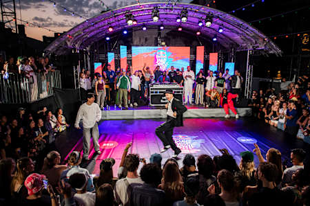 Crowds surround the stage as Arvidos goes head to head with Zen-G at Red Bull Dance Your Style in Malmö, Sweden, for the 2025 final, celebrating creativity and urban dance culture.