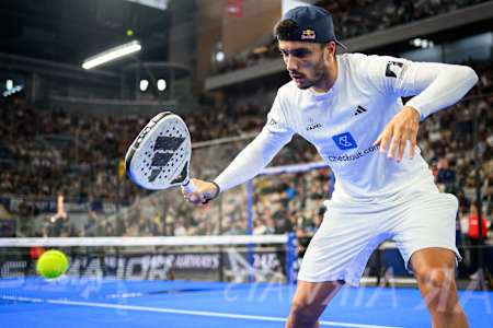 Alejandro Galán of Spain fiercely returns a shot during the Alpine Paris Major Premier Padel final match at Roland Garros Stadium in Paris, France, on September 14, 2025