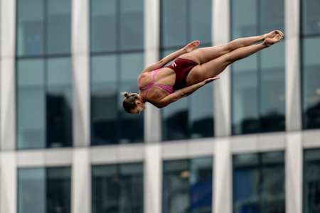 Rhiannan Iffland of Australia dives from the 21 metre platform atop the Institute of Contemporary Art during Red Bull Cliff Diving World Series Boston 2025 practice day