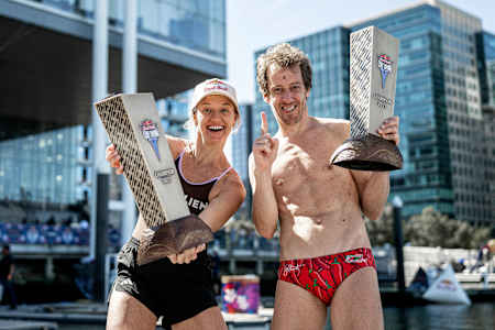 Rhiannan Iffland (L) of Australia and Gary Hunt of France celebrate after winning the 2025 World Series King Kahekili trophies