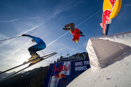 Jason Paul of Germany backflips behind skier Sebi Mall in Kitzbühel, Austria in January 2026.
