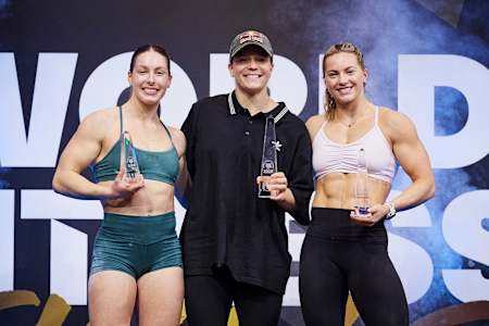 1st place - Laura Horvath, 2nd place - Aimee Cringle and 3rd place - Emma Lawson pose for a photo on the podium at the World Fitness Project Finals 2025 in Copenhagen, Denmark on December 21, 2025. 