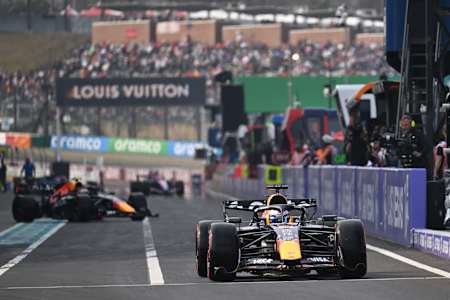 Max Verstappen leaves the pit lane during qualifying ahead of the F1 Grand Prix of Japan at Suzuka Circuit in 2026 