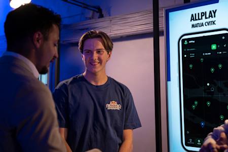 A winner of Red Bull Basement National Final 2026 stands by his project display in Stockholm, Sweden, showcasing innovation and dynamic energy at the event