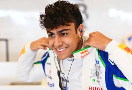 Arvid Lindblad of Great Britain and Visa Cash App Racing Bulls prepares to drive in the garage during F1 Testing at Yas Marina Circuit on December 09, 2025 in Abu Dhabi, United Arab Emirates. 