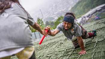 Participants compete in the Red Bull 400 at the Okurayama Ski Jump Stadium in Sapporo, Japan on May 21, 2017