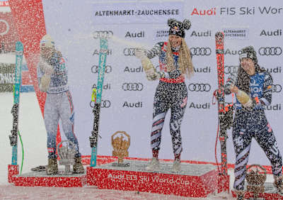 L-R: Kajsa Vickhoff Lie, Lindsey Vonn and Jacqueline Wiles spray champagne on the podium at the FIS Apline Skiing World Cup on January 10, 2026 on Zauchensee, Austria.