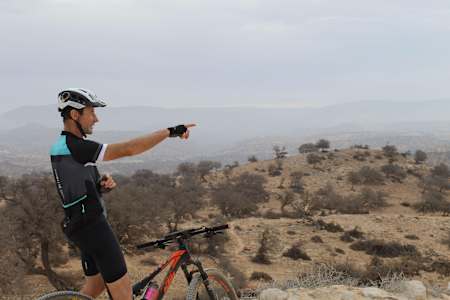 Martin points out the next step of the trail