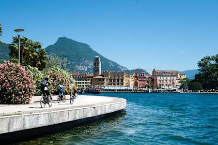 Eleonara Farina, Mirco Montagni and Marco Giacomello biking at Lake Garda, Italy on June 15, 2018.