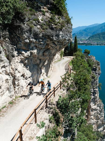 Eleonara Farina, Mirco Montagni and Marco Giacomello biking at Lake Garda, Italy on June 15, 2018.