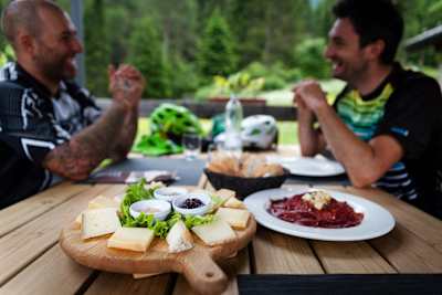 Felippe Zoffoli and Cristian Vender having lunch in Val di Sole, Italy on June 12, 2018.