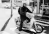 Gou Miyagi astride his moped.