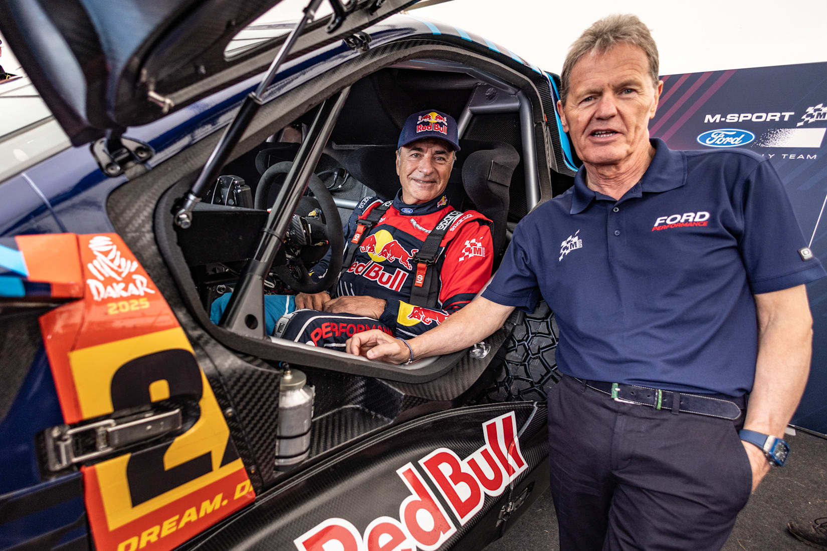 Carlos Sainz and Malcolm Richards at the Ford Raptor T1+ Announcement for Dakar 2025, Goodwood festival of speed, UK on July 12, 2024