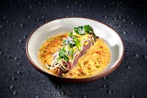 Order up globally inspired cuisine at Sparrow + Wolf in Chintatown.