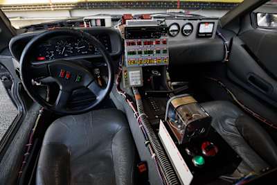 DeLorean's time machine from Back to the Future. Flux capacitor fluxing? Good. Now just grab some plutonium and you're ready.