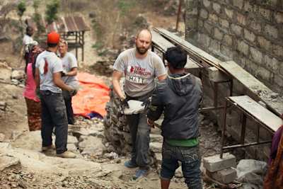 Former British soldier Matt Fisher assists rebuilding in Nepal as part of Team Rubicon's efforts.