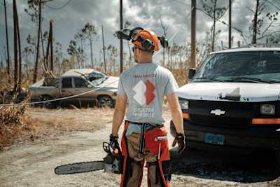 A ‘greyshirt’ surveys the aftermath of Hurricane Dorian in the Bahamas last September.