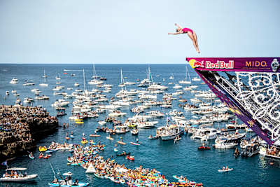 As a girl growing up in Kansas, Smart had dreams of diving in the Olympics. That didn’t materialize, but a fortuitous jump off a cliff into a river sealed her fate as a cliff diver.