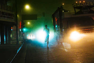Into the unknown: Runners set off on a fog-filled morning in Santa Monica.