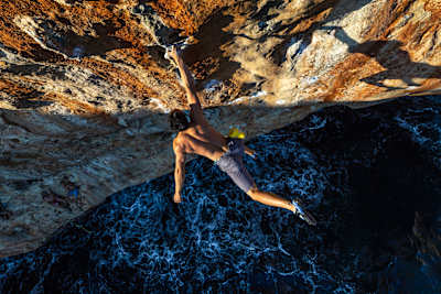 Daniel Fong climbs at Palma de Mallorca, Spain