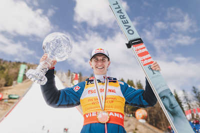 Overall World Cup winner Daniel Tschofenig poses with the Crystal Globe during the FIS Ski Jumping World Cup Finals at the Planica Ski Flying Hill in Ratece, Slovenia on March 30, 2025. 