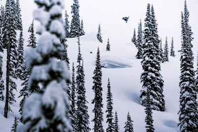 Nils Mindnich gets air from a natural feature during Natural Selection Snow finals in Revelstoke, Canada in March 2026.