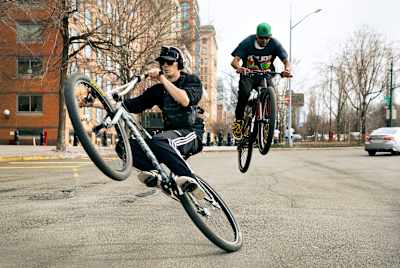 Bike Life riders Latti Datti and YourBoyFromBK showcase stunts in New York City.