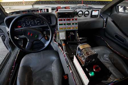 DeLorean's time machine from Back to the Future. Flux capacitor fluxing? Good. Now just grab some plutonium and you're ready.