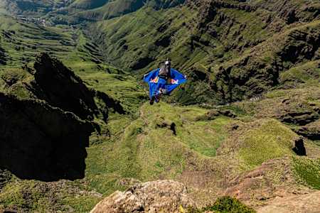 Miles Daisher of Red Bull Air Force jumps off the Eastern Buttress, Drakensberg, South Africa, on December 12, 2018.