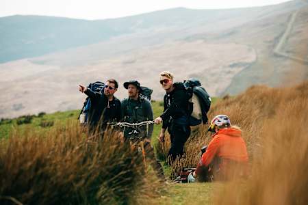 A discussion on the set of The Old World mountain bike film.